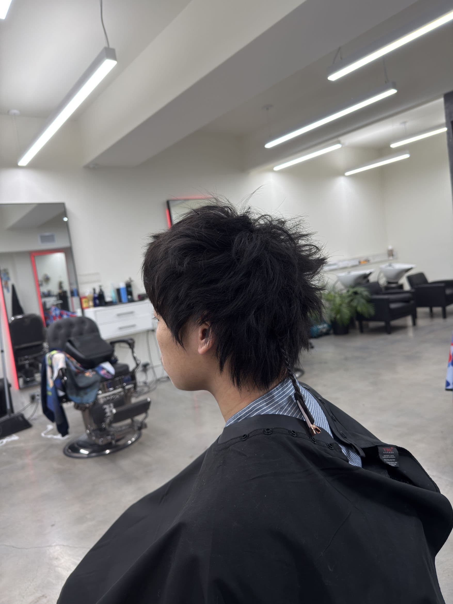 Textured men's longer hairstyle by Visionfades Studios