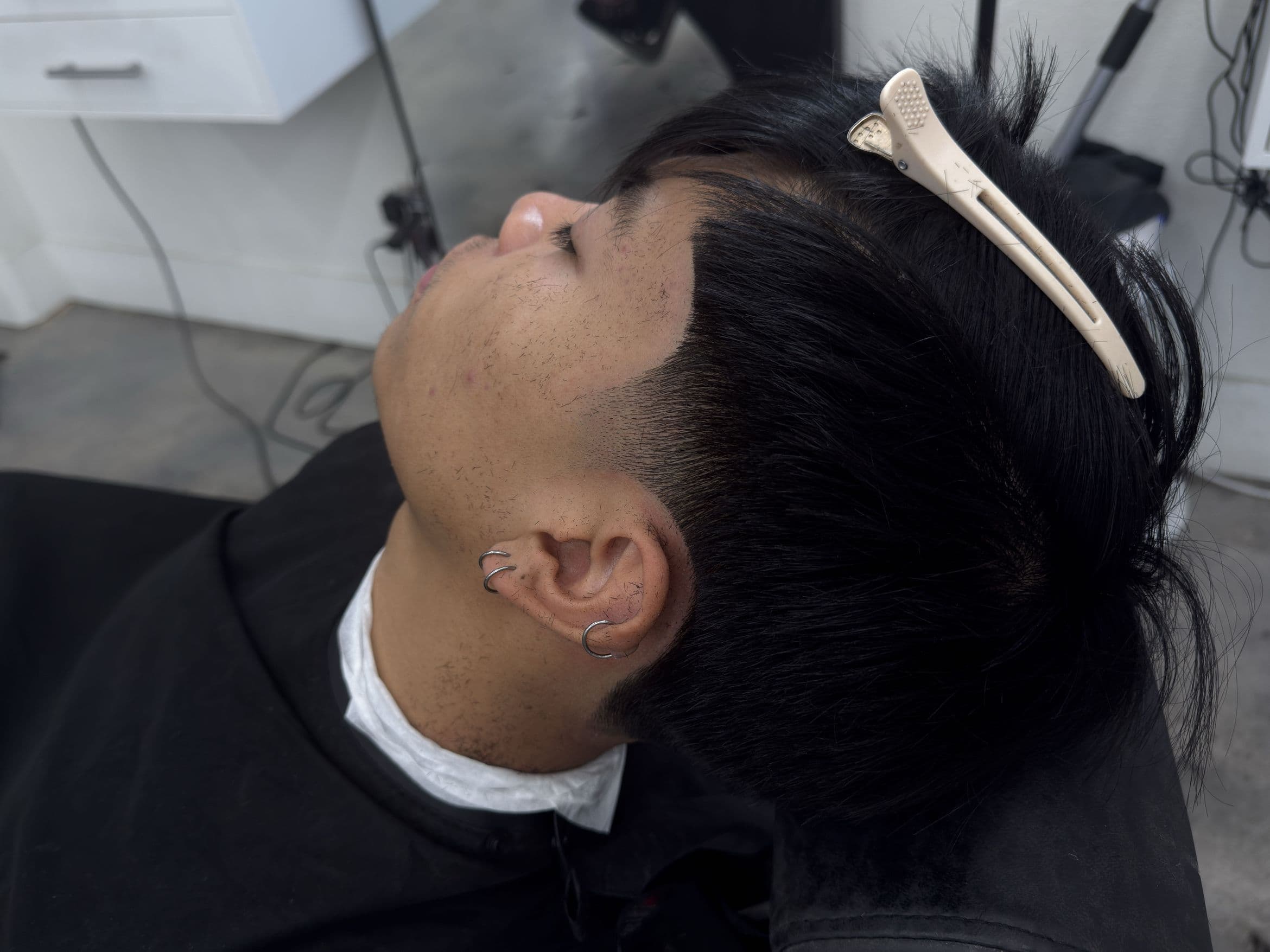 Clean fade with longer top by Visionfades Studios